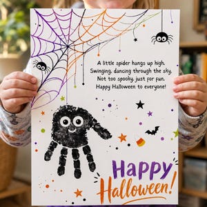 May include: A white rectangular print featuring a black handprint spider with googly eyes, a colourful spiderweb, and the text: A little spider hangs up high. Swinging, dancing through the sky. Not too spooky, just for fun. Happy Halloween to everyone!