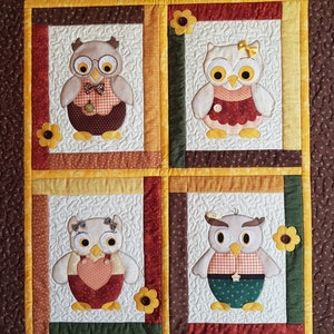 Digital pattern for a quilted wall hanging , Owl be watching yooo!, depicting a cute appliqued owl family.