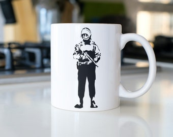 Tasse / Becher Banksy "Smiley Police"