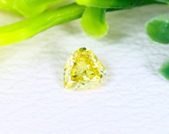 Pretty little yellow Fancy Diamond (IGEC Certificate)