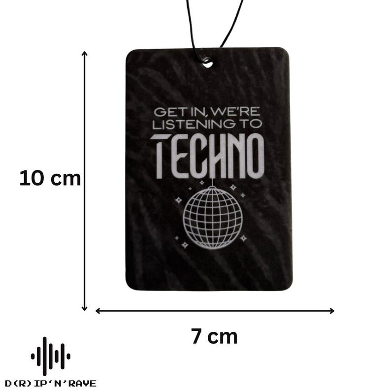 May include: Black air freshener with the text "GET IN, WE'RE LISTENING TO TECHNO" and a disco ball graphic. The rectangular freshener measures 3.9 inches wide by 2.8 inches tall. A black string is attached for hanging.