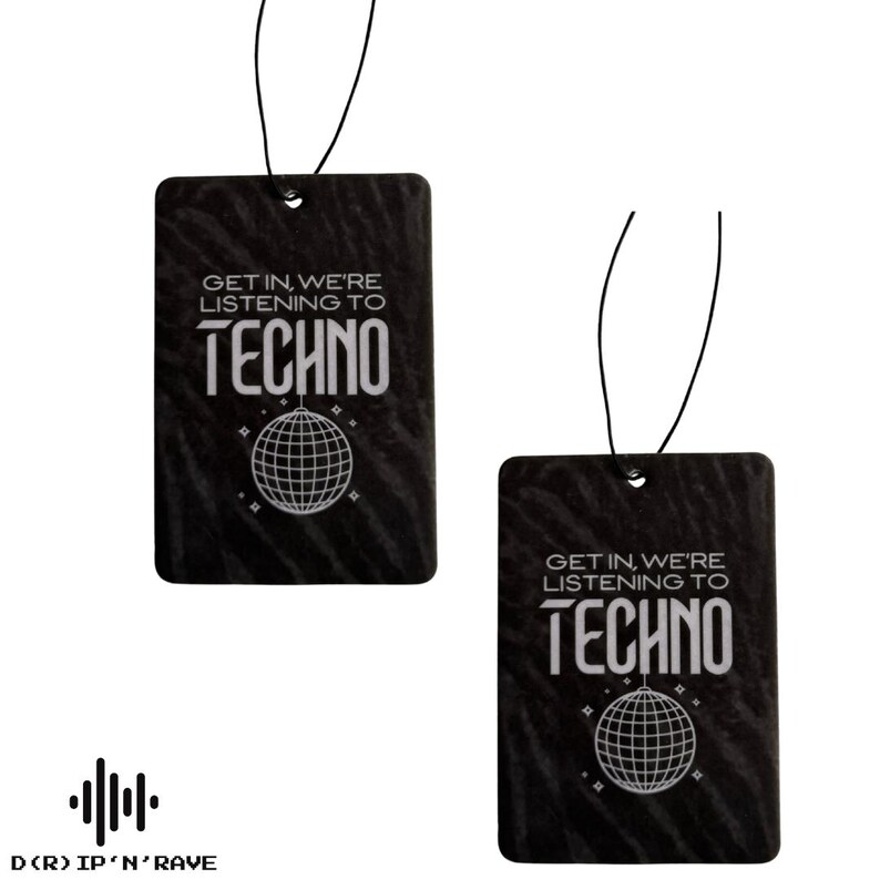 May include: Two black rectangular air fresheners with the text "GET IN, WE'RE LISTENING TO TECHNO" and a disco ball graphic. Each freshener has a black string for hanging. The bottom of the image has the text "D(R) IP'N'RAVE".