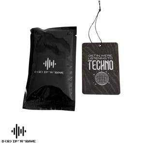 May include: Black air freshener with the text "GET IN, WE'RE LISTENING TO TECHNO" and a graphic of a globe. A black packet with the text "D(R) IP'N'RAVE" and a sound wave graphic is also in the image.