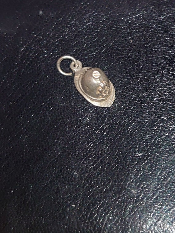 Police helmet charm. In good condition fully test… - image 1