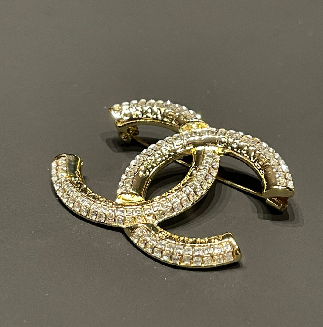 Chanel Gold Ribbon Brooch with Pearls, Crystals and CC Logo