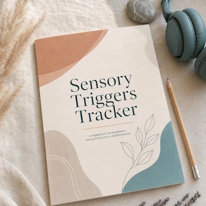 May include: A workbook titled "Sensory Triggers Tracker" with a soft cover featuring abstract shapes in muted colors. The book is accompanied by a pencil, headphones, and sprigs of lavender, suggesting a focus on mindfulness and self-awareness.
