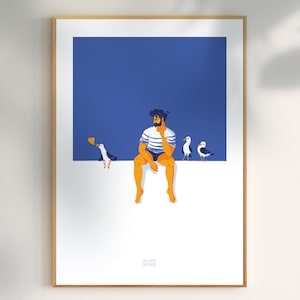 Op de afbeelding: Een ingelijste kunstafdruk met een man in een gestreept shirt en korte broek, zittend met zeemeeuwen tegen een blauwe achtergrond. Een zeemeeuw houdt een hart vast. Het kunstwerk heeft een minimalistische, cartoonachtige stijl.
