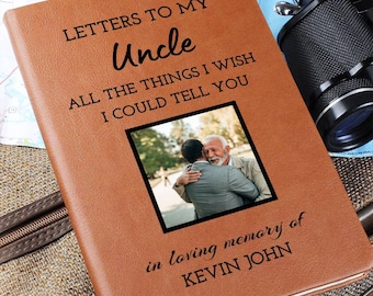 May include: A brown leather journal with the text "Letters to My Uncle All the Things I Wish I Could Tell You" and a photo of two men hugging. The text "in loving memory of KEVIN JOHN" is also on the journal.