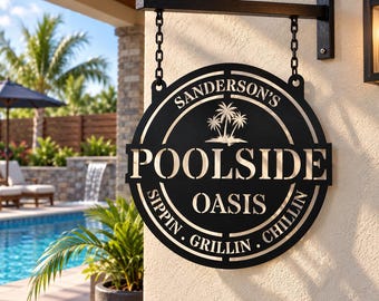 May include: A circular black metal hanging sign with a matte finish, suspended by two black chains from a wall-mounted bracket. The sign features cut-out text reading SANDERSON'S POOLSIDE OASIS and SIPPIN. GRILLIN. CHILLIN, with a palm tree graphic.