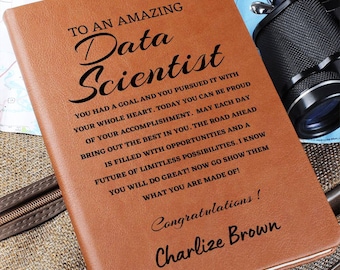May include: A brown leather journal with the text "To an amazing Data Scientist" and a personalized message: "Congratulations! Charlize Brown".