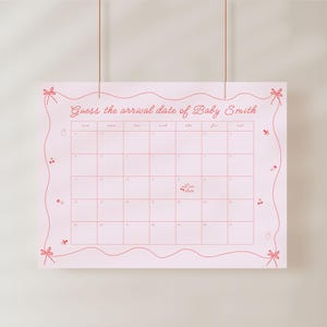 May include: A pink calendar with a wavy border and pink bows. The text "Guess the arrival date of Baby Smith" is at the top of the calendar.