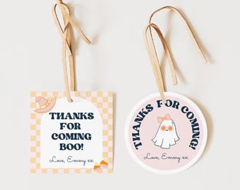 May include: Two Halloween-themed gift tags with pink and orange checkered backgrounds. One tag is square with a witch's hat and the text "THANKS FOR COMING BOO! Love, Emmy xx". The other tag is round with a ghost wearing sunglasses and the text "THANKS FOR COMING! Love, Emmy xx".