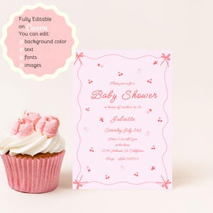 May include: Pink baby shower invitation with a white background and red text. The invitation says "Please join us for a Baby Shower in honor of mother-to-be Juliette. Saturday July 21st from 11 am till 2 pm at her home 1234 Johnson St. California. Rsvp 555-098793."