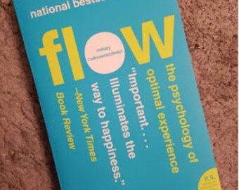 Flow: The Psychology of Optimal Experience' by Mihaly Csikszentmihalyi—unlock true happiness, creativity.