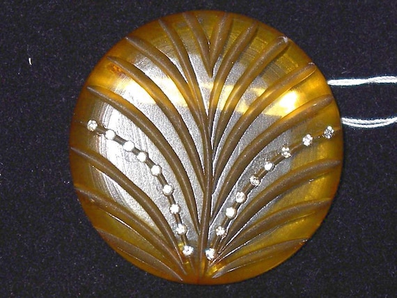 Apple juice Bakelite carved Deco brooch with rhinestones