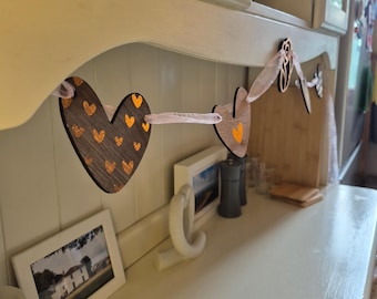Handcrafted Wooden Heart Garland: Rose Gold Anniversary Bunting Personalised by Proctor