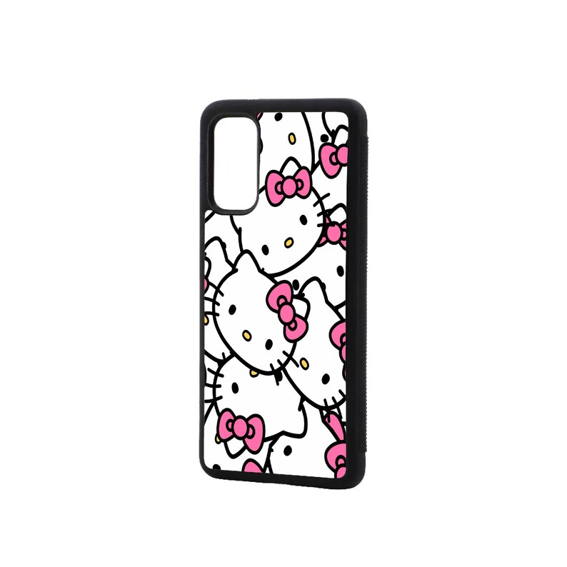 May include: Black phone case with a white background and a repeating pattern of Hello Kitty faces with pink bows.