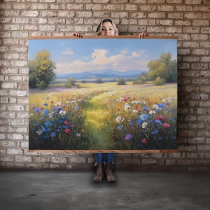 May include: A painting of a field of wildflowers in a landscape setting. The field is filled with blue, white, and pink flowers. The painting has a bright, sunny feel.