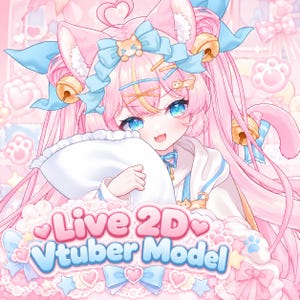 May include: An anime-style character with long pink hair, cat ears, and blue eyes, wearing light blue bows and gold bells. The character holds a white pillow. The text Live 2D Vtuber Model is displayed in pink and blue at the bottom.