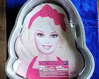 Three Iconic Vintage Wilton Cake Pans - Barbie 2012/Strawberry Shortcake 2003/Dora The Explorer 2012