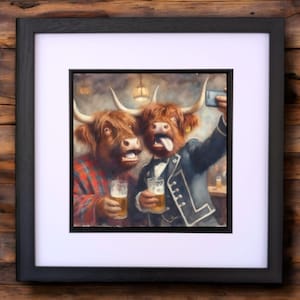 May include: Two Highland cows dressed up in formal attire, one wearing a kilt and the other a tuxedo, are holding beers and taking a selfie. The cow in the tuxedo has its tongue sticking out.