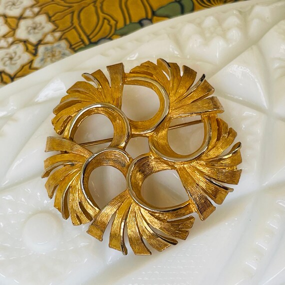 Broche Vintage étoile en métal doré et strass USA années 80/90