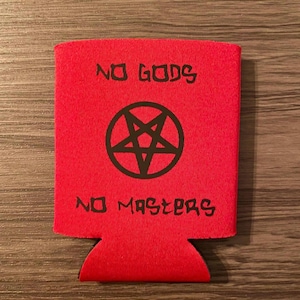 May include: Red beverage insulator with the text "NO GODS" above a black pentagram and the text "NO MASTERS" below. The insulator is designed to keep drinks cold and features a cutout for a can or bottle.