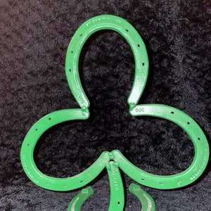 Lucky Shamrock made from welded iron horseshoes