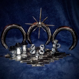 Beautiful Snowman Nativity Set Made From Horseshoes, Nuts, And Washers. Custom shipping available contact seller