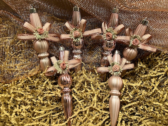 Large pink  hanging Christmas Victorian-style ornaments.
