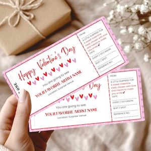 May include: Two pink Valentine's Day tickets with red and pink hearts. The tickets read "Happy Valentine's Day" and include space to write the recipient's favorite artist and the venue. A gift box is in the background.