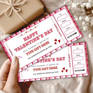 May include: Two Valentine's Day coupons with a pink and red plaid design. The coupons have the text "HAPPY VALENTINE'S DAY" and "TYPE GIFT HERE". Each coupon has space to write "TO", "FROM", and "DATE".