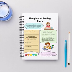 Flat lay of a workbook for kids and teens, highlighting fun and educational activities to explore and manage emotions.