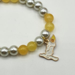 No candle in the wind, candle charm bracelet, yellow, pearl, shiny, one size, stretchy, handmade, fun, different, spooky, halloween