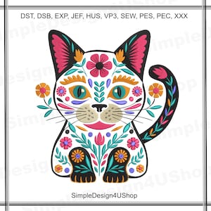 May include: A white cat with black ears and tail, decorated with colorful flowers and swirls in the style of Mexican Day of the Dead art. The cat is sitting with its paws crossed and has a friendly expression.