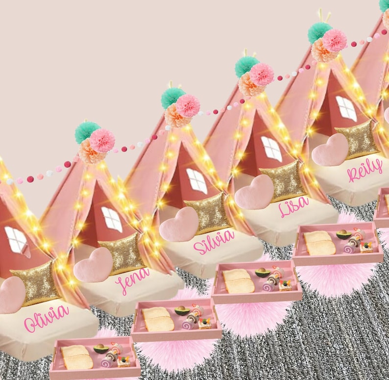 May include: Five pink teepees with gold glitter accents and white lights. Each teepee has a pink heart-shaped pillow and a gold pillow. The teepees are decorated with pink and white pom-poms and a string of pink and white beads. Each teepee has a name on it: Olivia, Jena, Silvia, Lisa, and Reilly. There are pink trays with snacks in front of each teepee.