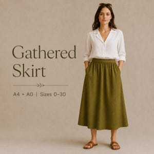 Può includere: Una gonna lunga arricciata color verde oliva abbinata a una camicia bianca con colletto e sandali marroni. Il testo sull'immagine recita Gathered Skirt, A4 + A0 | Sizes 0-30, con una piccola icona a forma di foglia tra le righe.