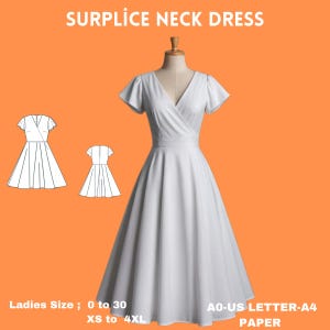 May include: A white surplice neck dress on a mannequin with short sleeves and a flared skirt. The dress has a V-neckline and a wrap-style bodice. The image includes line drawings of the dress and text that reads "SURPLICE NECK DRESS" and "Ladies Size; 0 to 30 XS to 4XL PAPER".