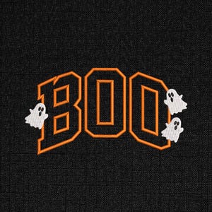 May include: Embroidered design on black fabric. The word "BOO" is in orange block letters with an orange outline. Two small white ghost figures are on the right side and one on the left. The ghosts have black eyes and mouths.
