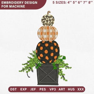 May include: Machine embroidery design featuring a stack of three pumpkins in a black planter with green foliage. The top pumpkin has a leopard print, the middle has an orange plaid pattern, and the bottom has orange polka dots. Text: EMBROIDERY DESIGN FOR MACHINE, 5 SIZES: 4" 5" 6" 7" 8", DST EXP JEF PES VP3 ART HUS XXX.