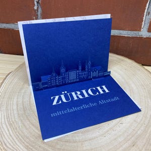 Vouwkaart Zürich - 3D skyline verschillende steden - cadeaukaart / reischequekaart om te vouwen met silhouet Zürich