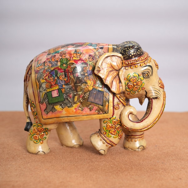 Éléphant en marbre peint à la main - Un chef-d'oeuvre artistique sur pierre, méticuleusement conçu pour infuser votre espace d'opulence culturelle