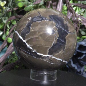 UV reactive volcano agate sphere