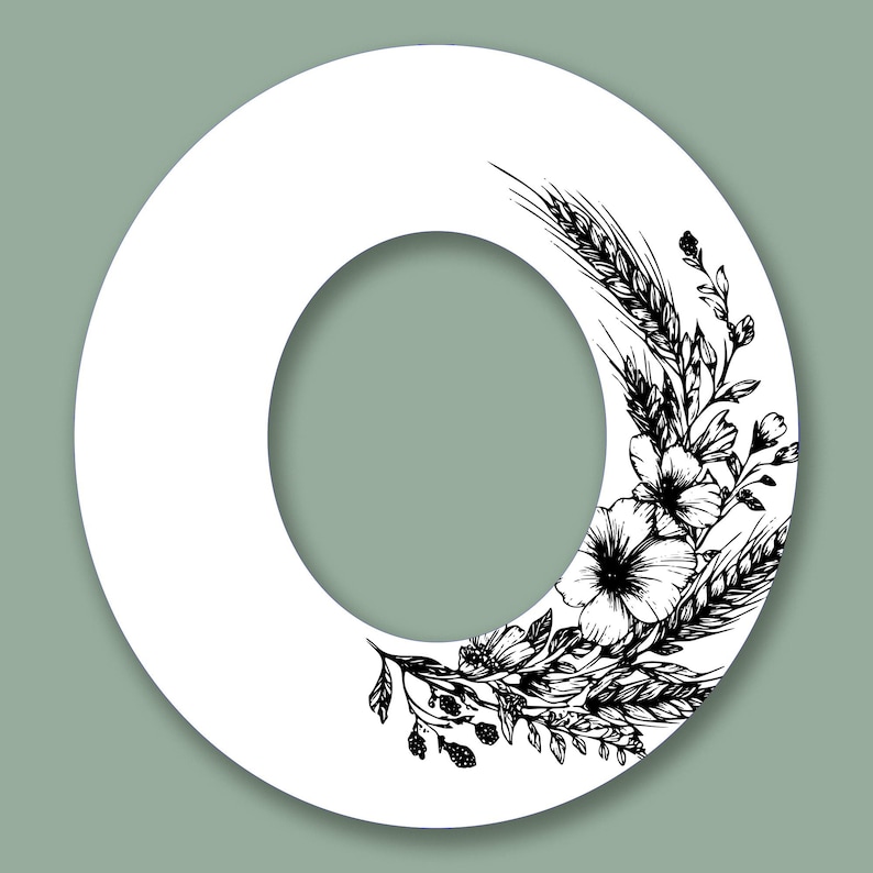 May include: White letter "O" with a floral and wheat design in black ink. The illustration features detailed botanical elements, including flowers, wheat stalks, and leaves, set against a soft green background.