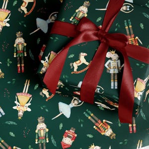 Classic Christmas gift wrap roll with nutcracker ballet motifs