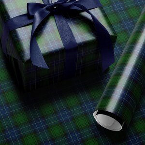 Traditional plaid wrapping paper featuring green navy tartan for elegant gift wrap