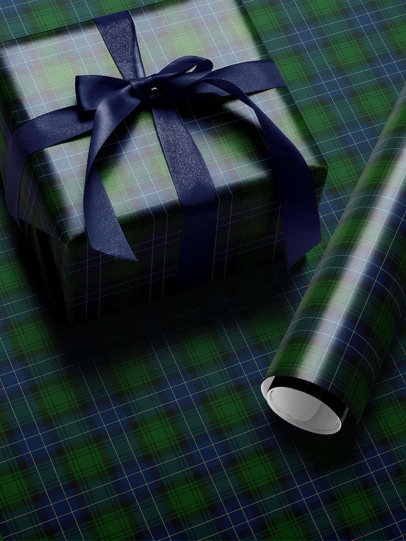 Traditional plaid wrapping paper featuring green navy tartan for elegant gift wrap