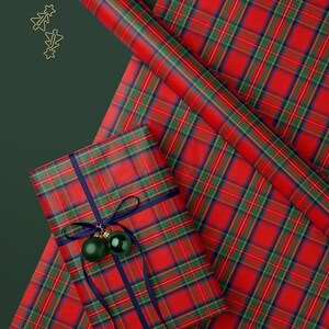 Preppy wrapping paper in royal steward classic red plaid, great for vintage-inspired Christmas packaging.