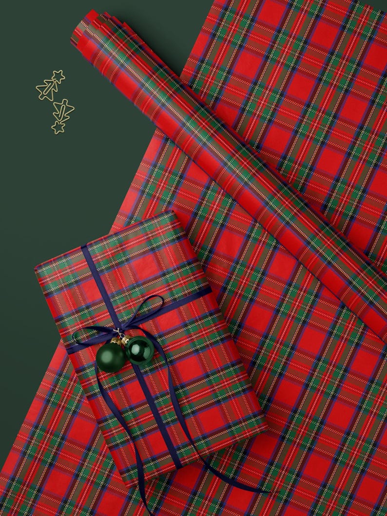 Preppy wrapping paper in royal steward classic red plaid, great for vintage-inspired Christmas packaging.