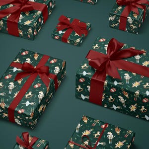 Festive holiday wrapping paper with nutcracker characters in vintage style